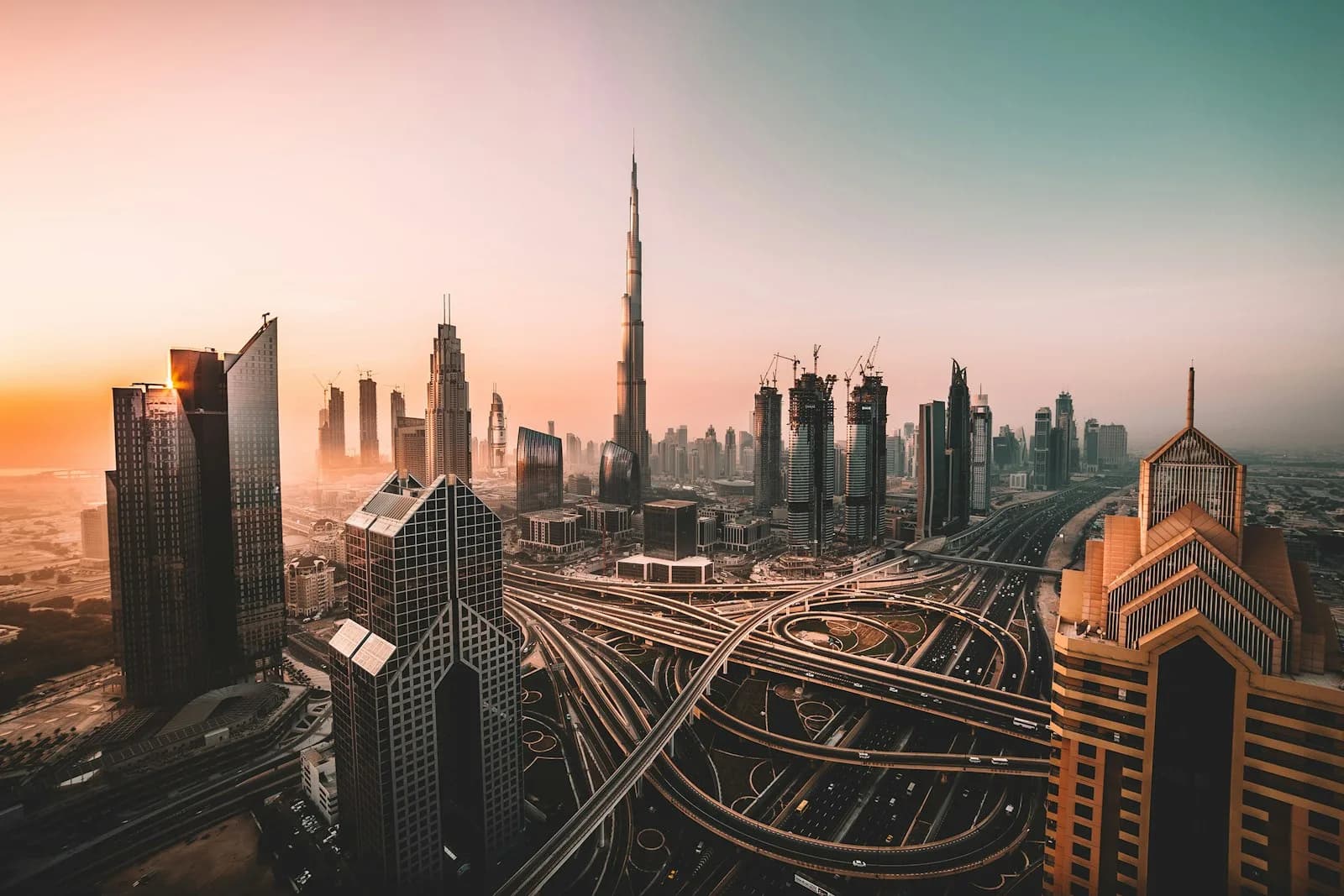 Downtown Dubai skyline at golden hour with Burj Khalifa