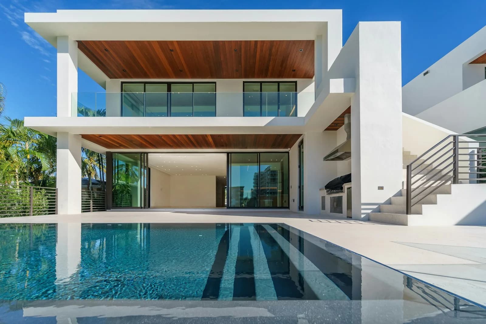 Modern villa with wood-panelled ceiling and private pool